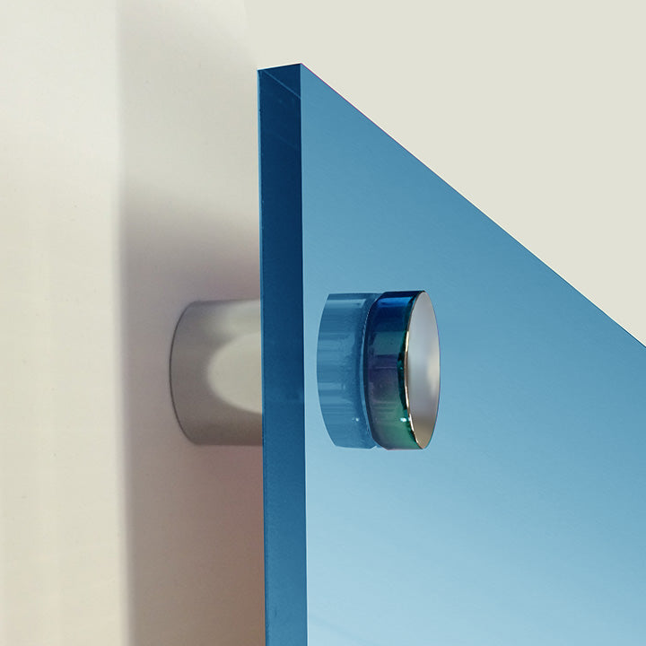 Blue door with silver handle on a white background
